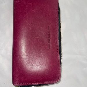 EUC Portland Leather zip around wallet.